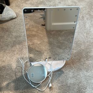 Lighted makeup vanity mirror